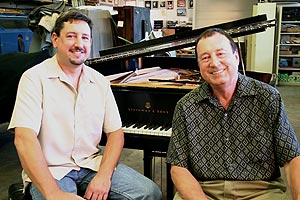 Father and son piano restoration team of Franco (l) and Giovanni (r) Skilan