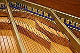 Close-up view inside restored hybrid piano