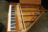 Side view showing inside of restored hybrid piano