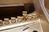 Replacing old piano agraffes with new on Steinway and Sons Piano restoration