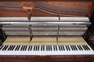 Open view of the Bösendorfer upright grand piano