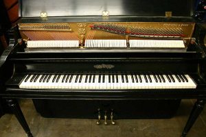 Chickering console piano used by Harry Warren showing restored components
