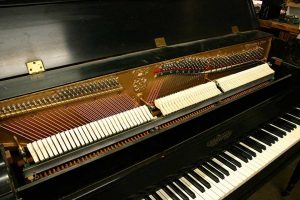 Chickering console piano used by Harry Warren restored close-up