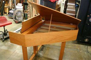 Open view showing inside of restored hybrid piano