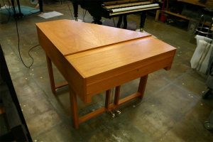 Closed view of restored hybrid piano