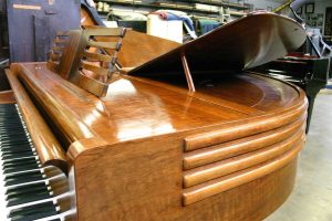 Wurlitzer Butterfly baby grand piano closeup