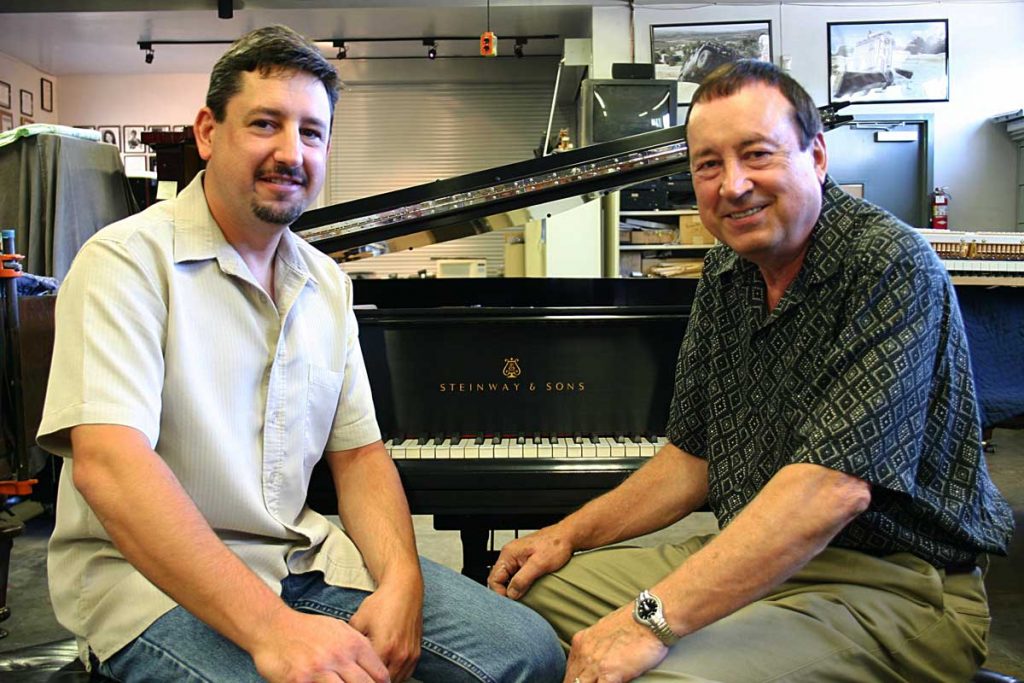 Franco and Giovanni with a restored Steinway and Sons piano in our studio