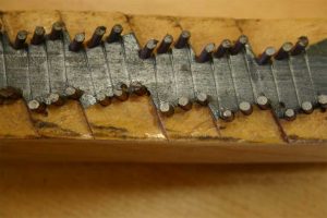 Piano manufacturing defects on bridge notching to be corrected