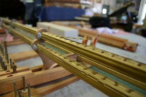 Defective and damaged Steinway and Sons piano patented Tubular Metallic Action Frame Rail requiring replacement