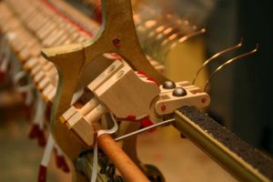 Restoring vintage Steinway and Sons pianos with accurately reproduced hammer-butt replacements