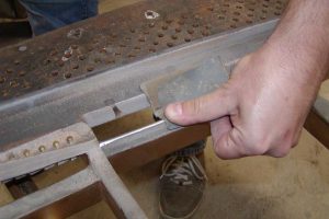 Piano capo bar restored to optimal shape during piano restoration