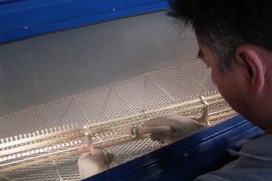 Glass bead blast cleaning of Steinway and Sons piano action stack to remove corrosion