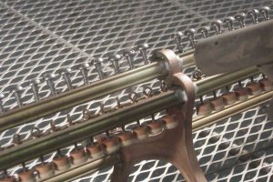 Glass bead blast cleaning of Steinway and Sons piano action stack to remove corrosion