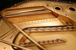 This Steinway piano restoration included a new soundboard with bridge cap and new pinblock as part of the project
