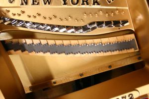 New bridge on Steinway piano after restoration