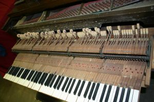 1920's vintage Steinway and Sons grand piano rendered completely unplayable by verdigris